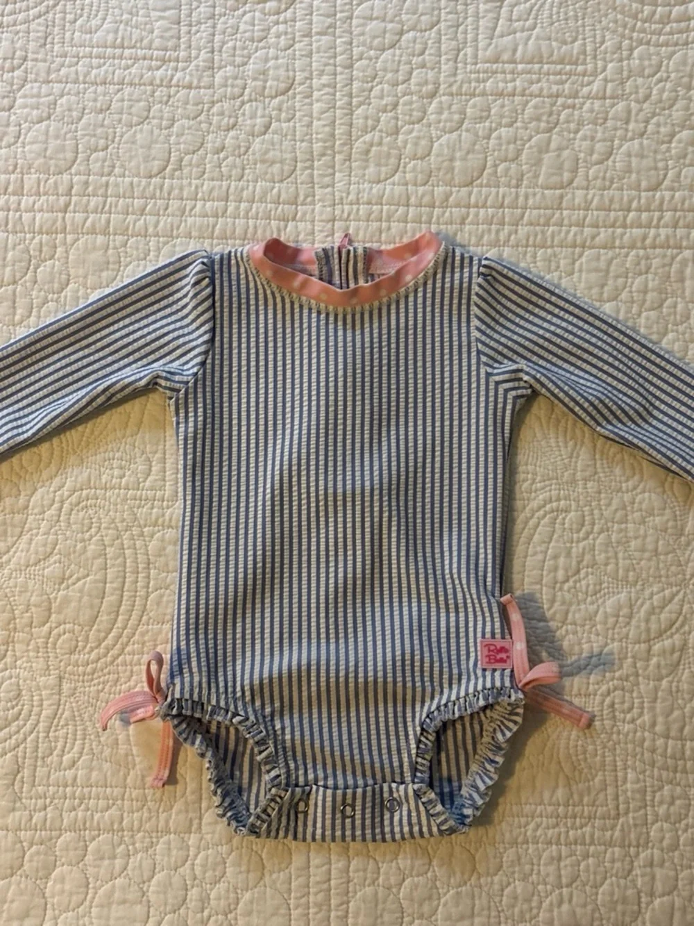 Ruffle Butts Blue and White Striped Long-Sleeve One-Piece with Pink Trim